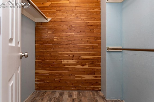 spacious closet with wood finished floors