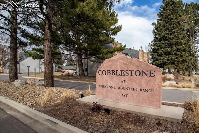 view of community sign