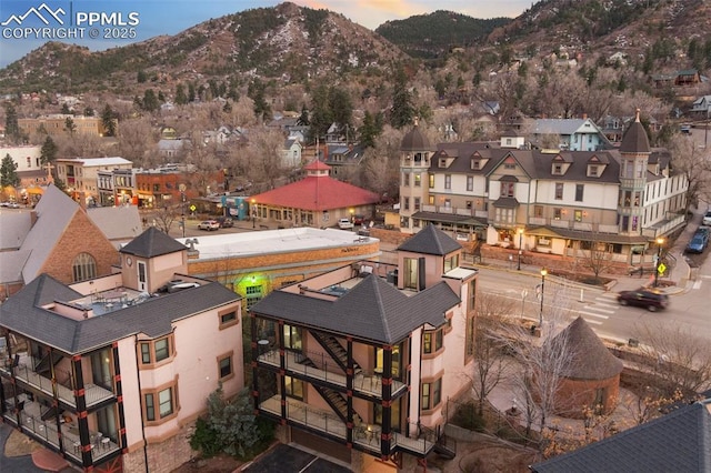 birds eye view of property with a residential view and a mountain view