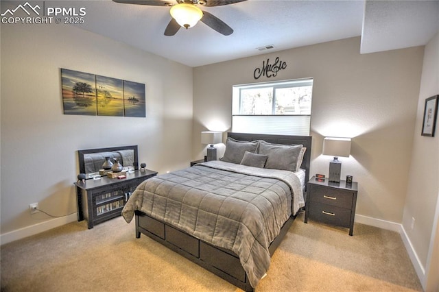 bedroom with baseboards, ceiling fan, visible vents, and light colored carpet