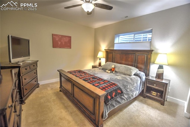 bedroom with baseboards, ceiling fan, and light colored carpet