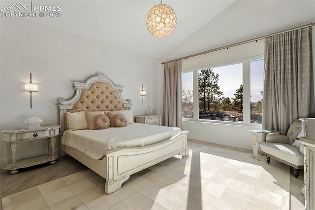 bedroom featuring lofted ceiling