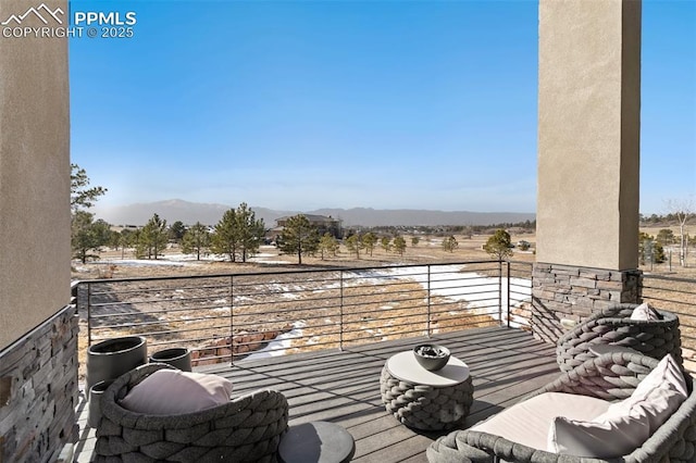 balcony with a mountain view and a rural view