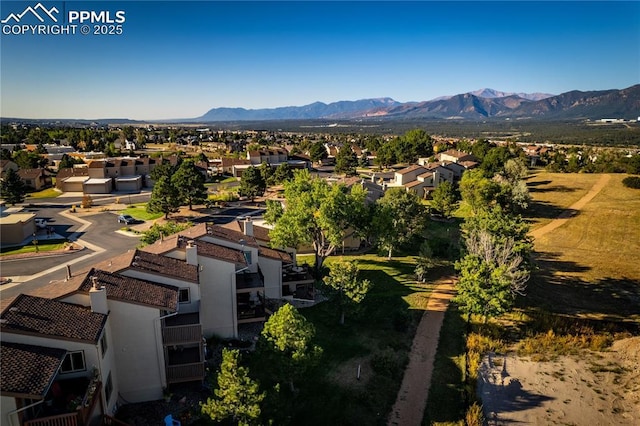 birds eye view of property featuring a residential view and a mountain view