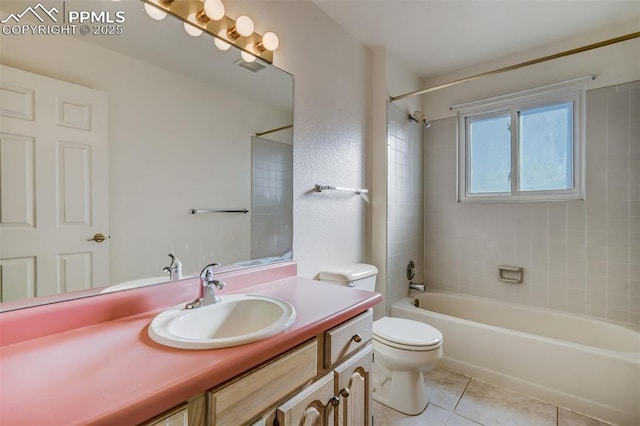 full bathroom featuring tile patterned flooring, toilet, vanity, visible vents, and bathing tub / shower combination