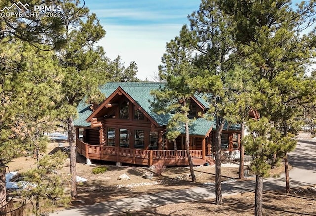 view of front facade with log exterior