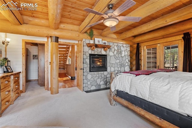 bedroom with beam ceiling, a stone fireplace, log walls, light colored carpet, and wood ceiling
