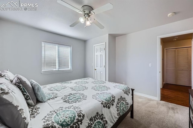 bedroom with ceiling fan, carpet, and baseboards