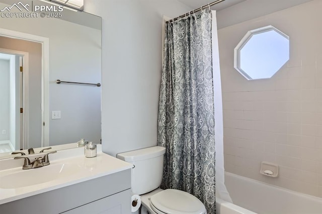 bathroom featuring toilet, shower / bathtub combination with curtain, and vanity