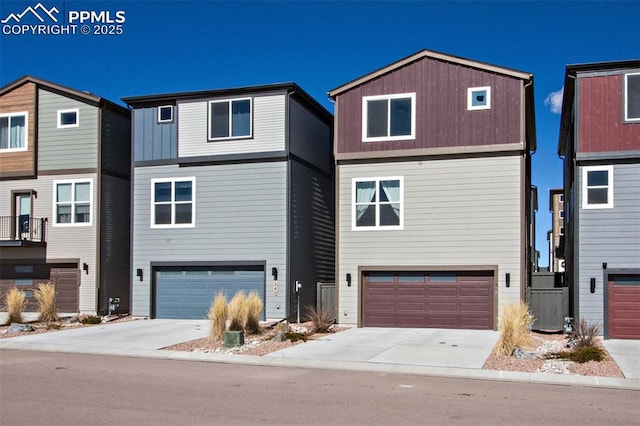 view of front facade with driveway and an attached garage