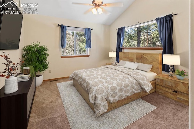 bedroom with baseboards, visible vents, a ceiling fan, lofted ceiling, and carpet floors