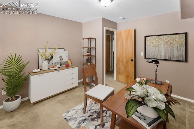 office featuring light carpet and baseboards