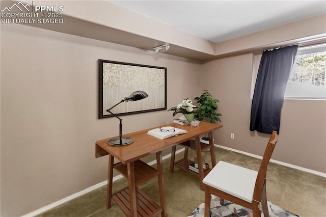 carpeted home office with baseboards