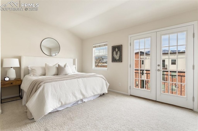 carpeted bedroom with lofted ceiling, access to outside, baseboards, and french doors