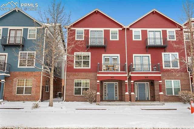 multi unit property featuring brick siding