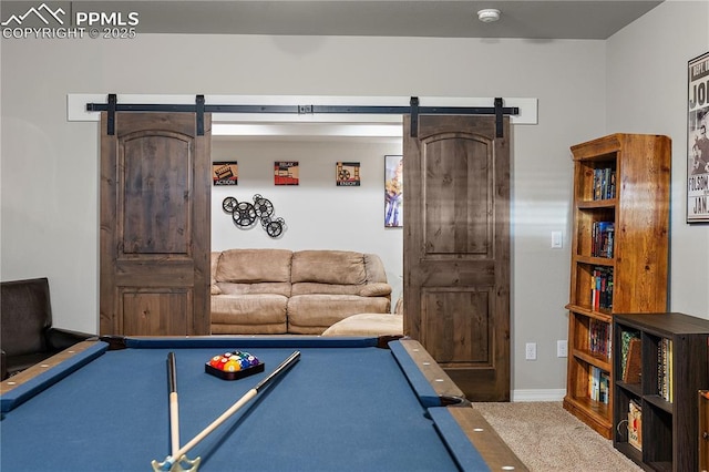 playroom with carpet floors, a barn door, and billiards