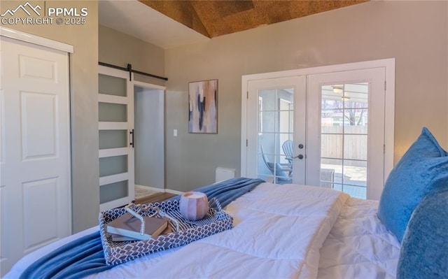 bedroom with access to exterior, french doors, a barn door, and baseboards