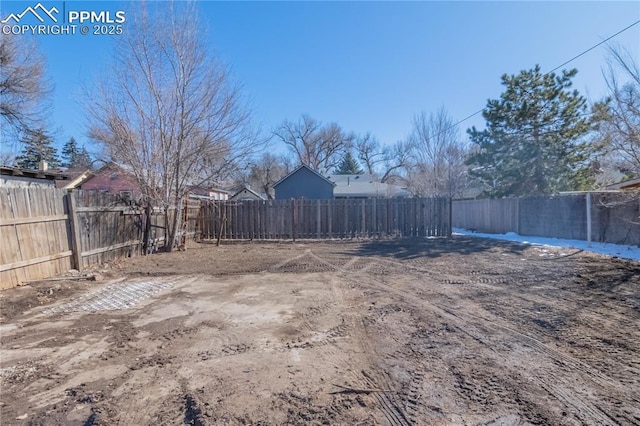 view of yard with fence