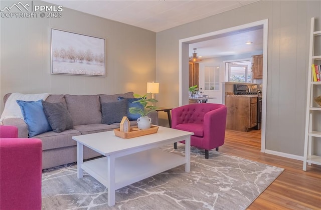 living room with wood finished floors