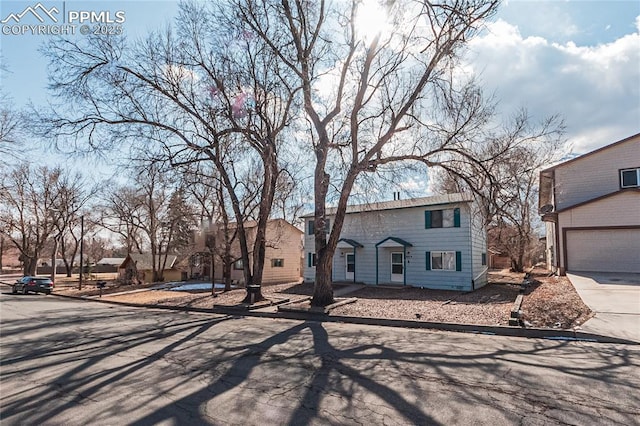 view of front of property with a garage