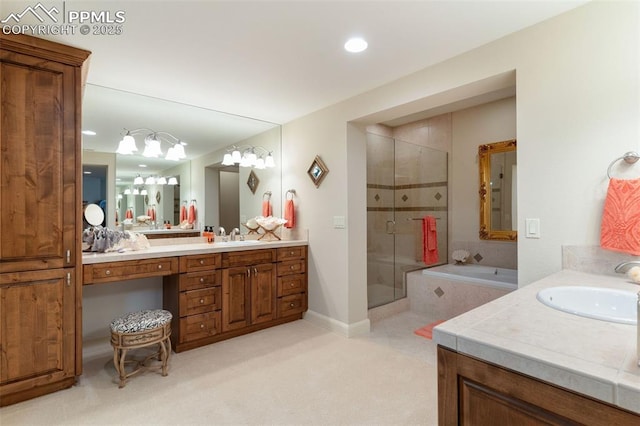 full bath with a shower stall, vanity, and a bath