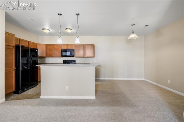 kitchen with a center island, brown cabinets, decorative light fixtures, light countertops, and black appliances