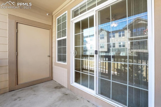 doorway to property with a patio