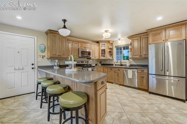 kitchen with light tile patterned flooring, a breakfast bar, a sink, appliances with stainless steel finishes, and open shelves