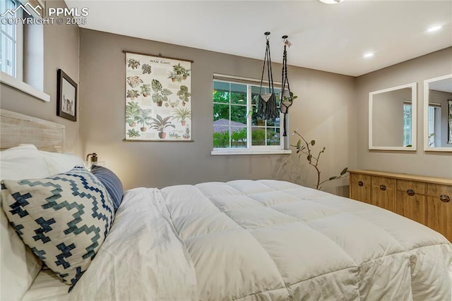 bedroom featuring recessed lighting