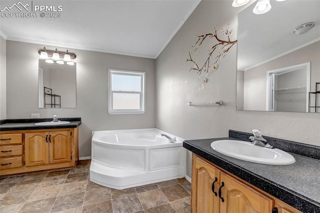 bathroom with crown molding, a sink, and a bath