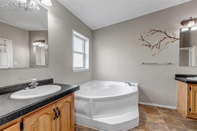 bathroom featuring a stall shower, two vanities, a sink, crown molding, and a bath