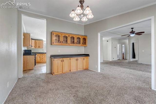 kitchen featuring dark countertops, glass insert cabinets, ornamental molding, open floor plan, and light carpet