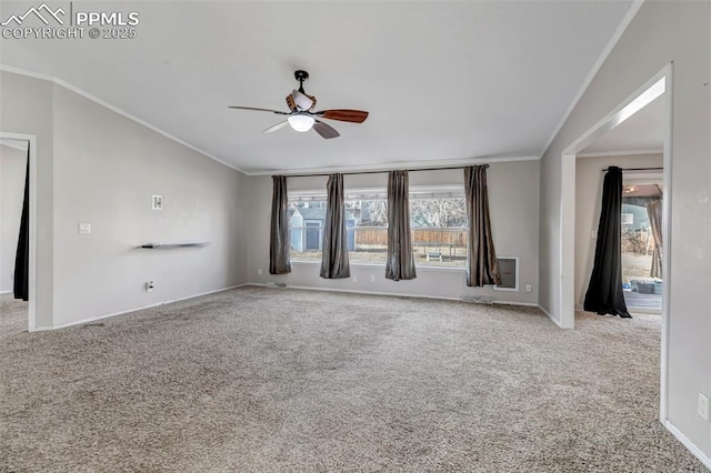 unfurnished living room featuring carpet floors, a ceiling fan, baseboards, vaulted ceiling, and ornamental molding