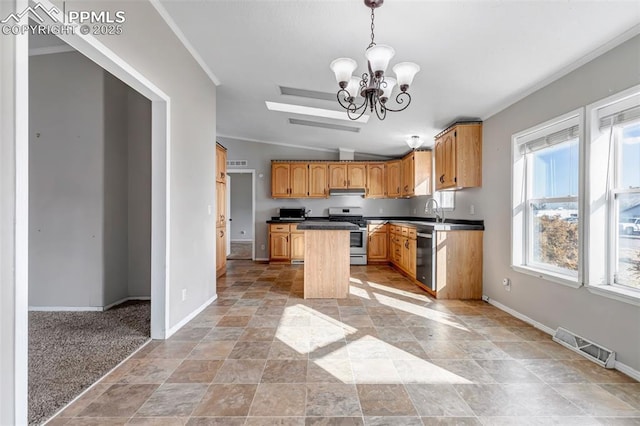 kitchen with pendant lighting, dark countertops, visible vents, appliances with stainless steel finishes, and a kitchen island