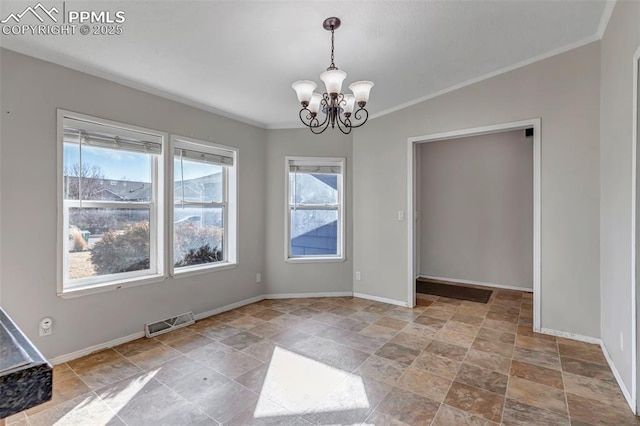 unfurnished dining area featuring crown molding, visible vents, a notable chandelier, and baseboards