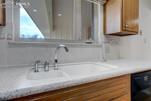 interior space with tasteful backsplash and vanity