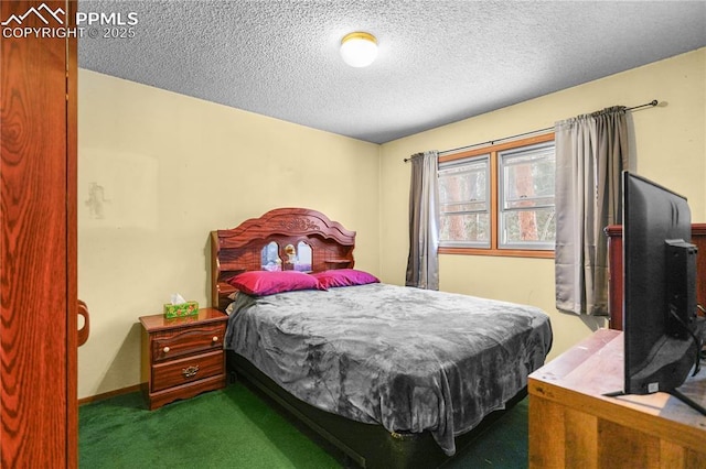 carpeted bedroom featuring baseboards and a textured ceiling