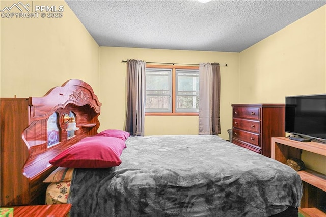 bedroom with a textured ceiling