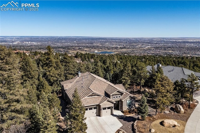 bird's eye view featuring a view of trees