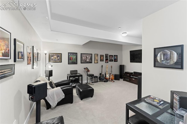 living room with light carpet and baseboards