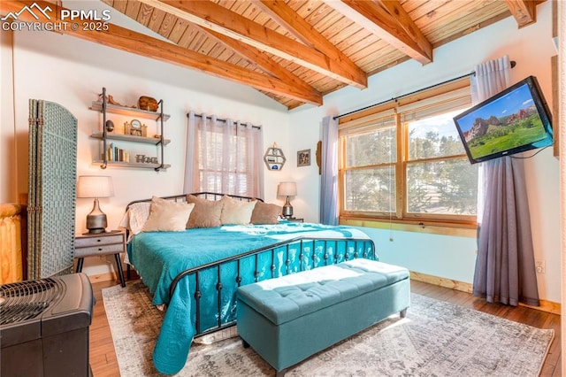 bedroom featuring wooden ceiling, lofted ceiling with beams, baseboards, and wood finished floors