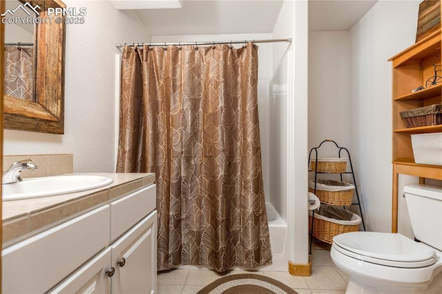 full bath with shower / tub combo with curtain, vanity, toilet, and tile patterned floors