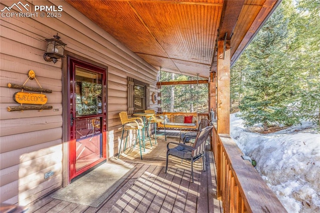 wooden deck with covered porch