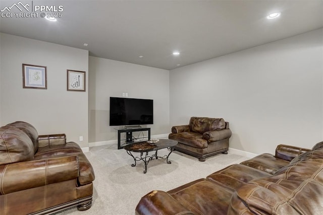 living room with carpet floors, recessed lighting, and baseboards