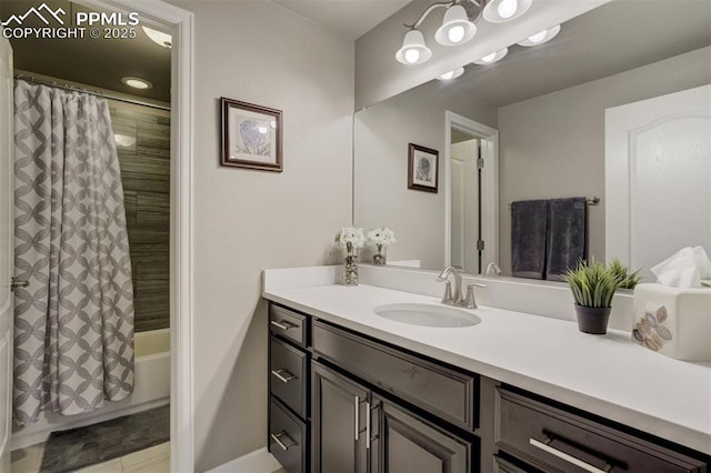 bathroom featuring shower / bath combination with curtain and vanity