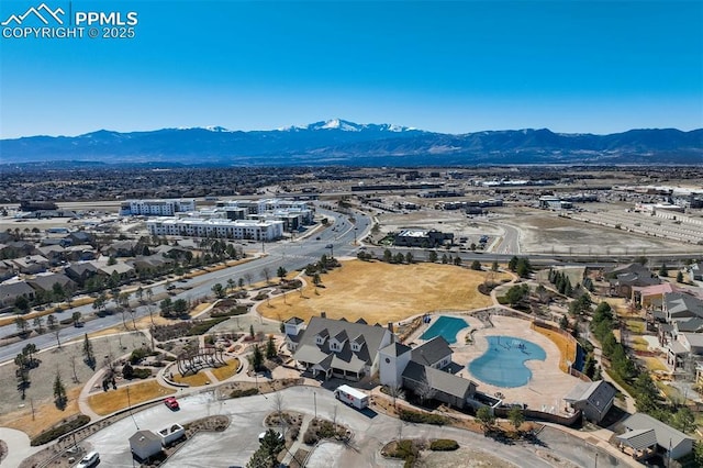 bird's eye view with a mountain view