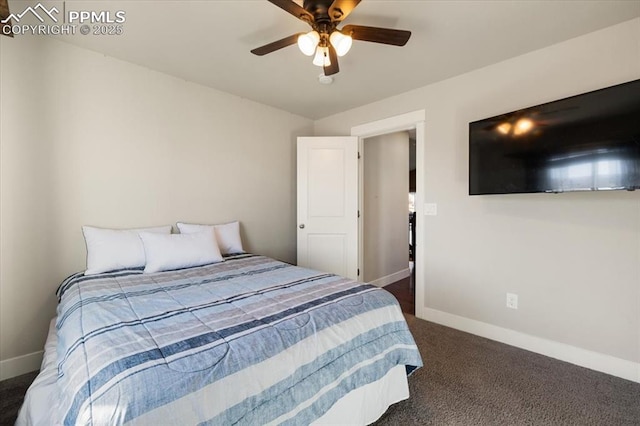 bedroom with dark colored carpet, a ceiling fan, and baseboards