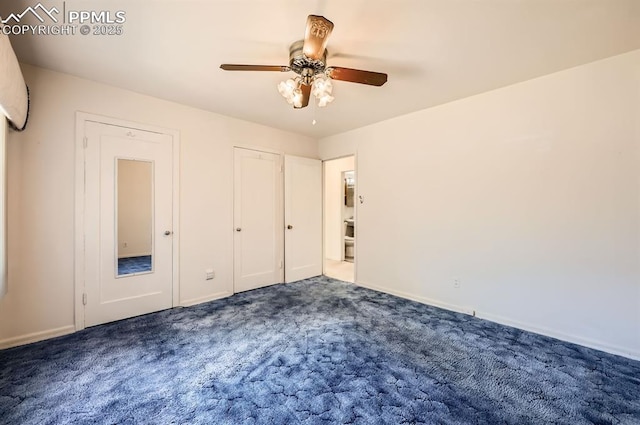 unfurnished bedroom featuring a ceiling fan, dark colored carpet, and baseboards