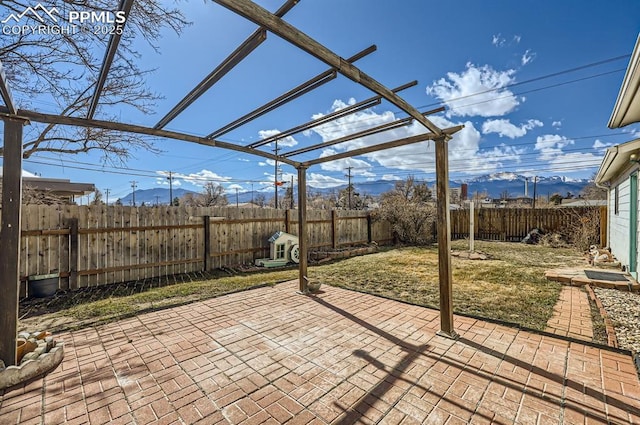 view of patio featuring a fenced backyard and a pergola