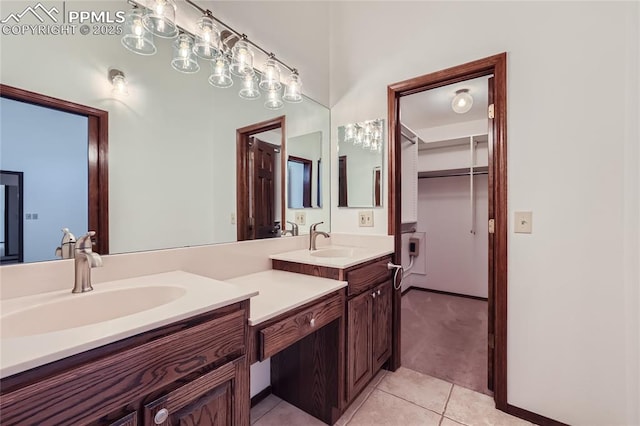 full bathroom with vanity and tile patterned floors